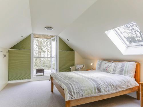 Voodi või voodid majutusasutuse Poppyfields Stable toas