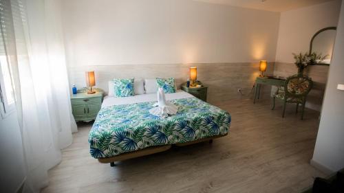Katil atau katil-katil dalam bilik di Hostal Escala Suites