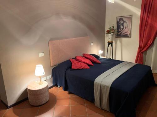 Llit o llits en una habitació de Villa Vaccoli