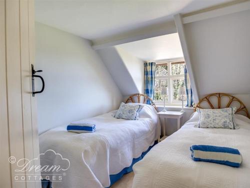 Postel nebo postele na pokoji v ubytování Pitt Cottage