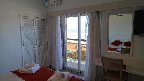 Postel nebo postele na pokoji v ubytování Gran Hotel Fontainebleau