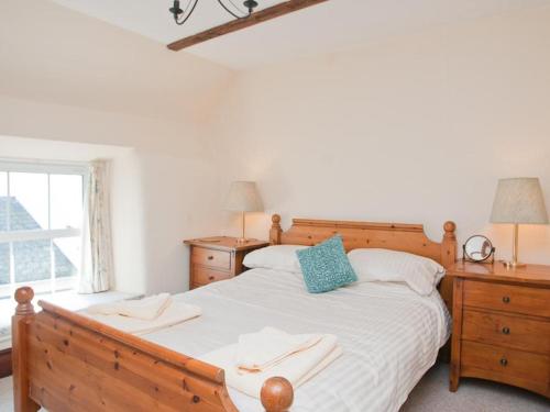 Postel nebo postele na pokoji v ubytování Hazel Cottage