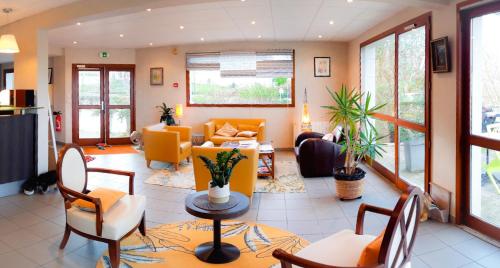 Χώρος καθιστικού στο Hotel Alicia Auray Le Bono