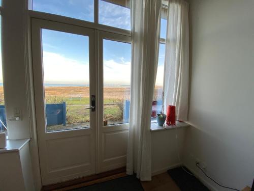 Zdjęcie z galerii obiektu Skærven Beachfront Apartments and Cottage w mieście Nyborg