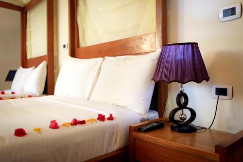 Postel nebo postele na pokoji v ubytování Mezena Resort & SPA