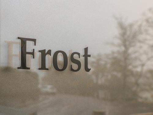 a close up of the word frost on a window at Frost in Ambleside
