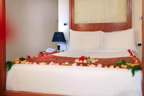 Postel nebo postele na pokoji v ubytování Mezena Resort & SPA