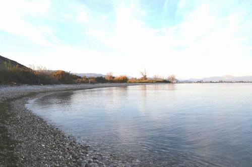 a view of a body of water with a rocky shore at CASA LELA 1...όπως μια φορά...like once in Míloi
