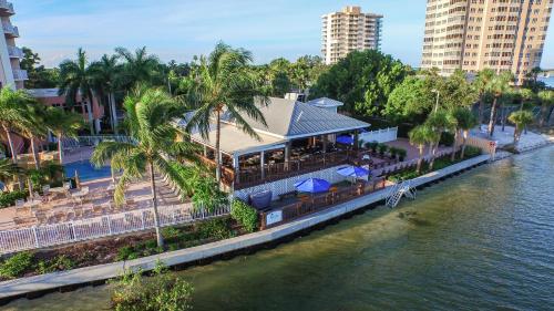 an aerial view of a building next to the water at Lovers Key Resort in Fort Myers Beach