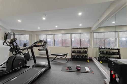 a fitness room with a treadmill and a gym at Best Western West Lebanon-Hanover in West Lebanon