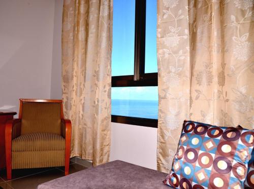 Un lugar para sentarse en Almog Tower