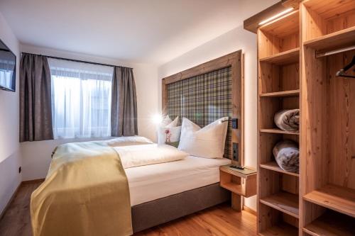 Postel nebo postele na pokoji v ubytování Appartements Rosengarten