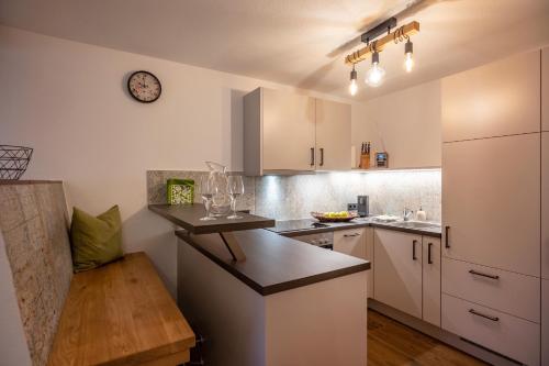Kuchyň nebo kuchyňský kout v ubytování Appartements Rosengarten