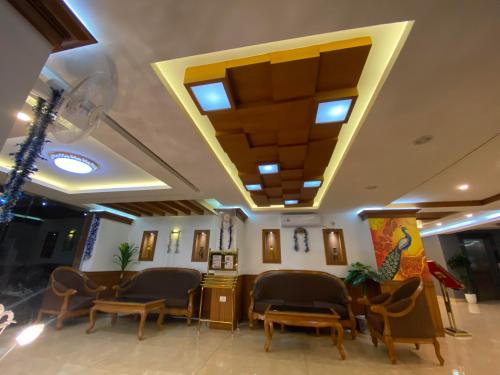 Ruang duduk di Utsavam Hotel Apartments