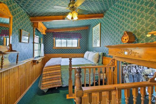 a bedroom with a bed in a room at Walk to Lake Cabin with Deck and Views in Fawnskin in Fawnskin