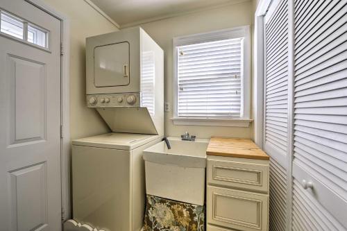 a small bathroom with a sink and a mirror at Breezy Ocean City Home Walk to Beach and Boardwalk! in Ocean City