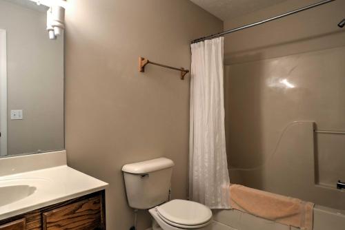 A bathroom at Creekfront Cabin Near Chattanooga with Hot Tub!