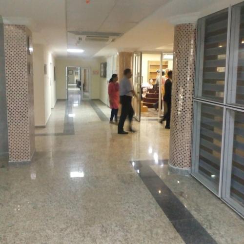 a group of people standing in a hallway in a building at Conference Hotel , Abeokuta in Abeokuta