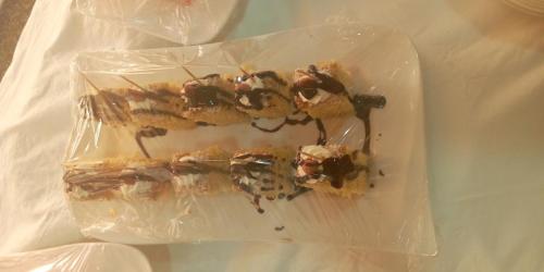 a piece of food in a plastic bag with a pastry at Conference Hotel , Abeokuta in Abeokuta