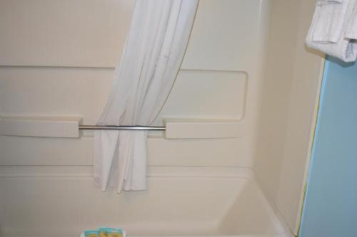 Ванная комната в Guest Cottages & Suites