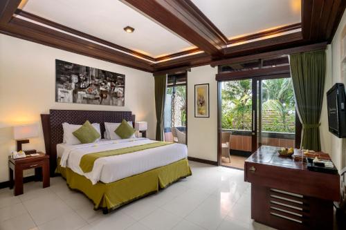 Cama o camas de una habitación en The Bali Dream Villa & Resort Echo Beach Canggu