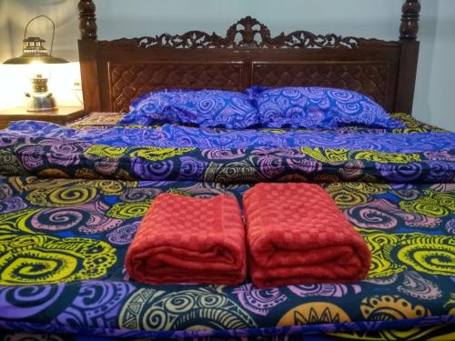 Кровать или кровати в номере KOPIKUIN bromo homestay