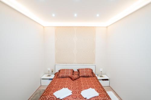 Posteľ alebo postele v izbe v ubytovaní Modern, Quiet & Cozy Apartment in the middle of Downtown near Danube at Fashion street