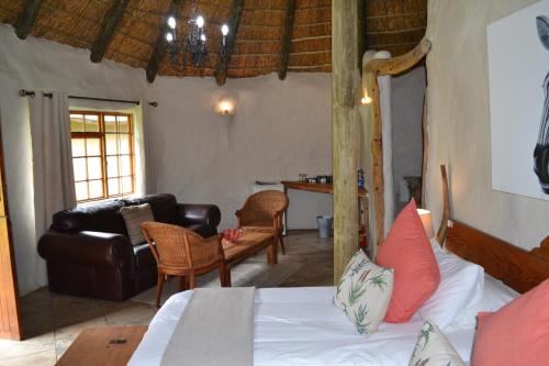 Zona de estar de Chrislin African Lodge