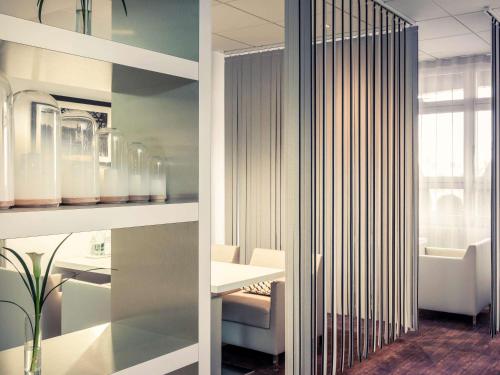 Кровать или кровати в номере Mercure Paris Massy Gare TGV