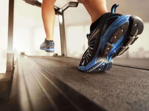 a person in running shoes walking on a treadmill at Ibis Styles Kuala Lumpur Fraser Business Park in Kuala Lumpur