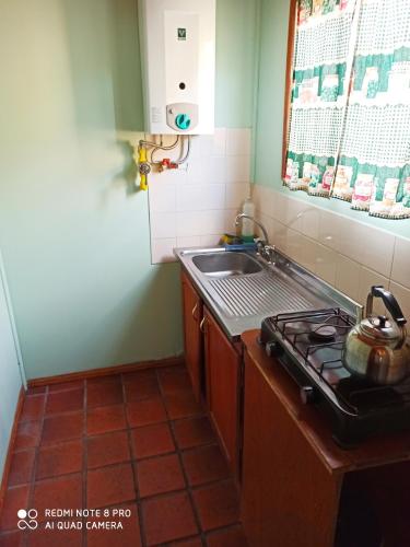 Kuhinja ili čajna kuhinja u objektu Mis Casitas