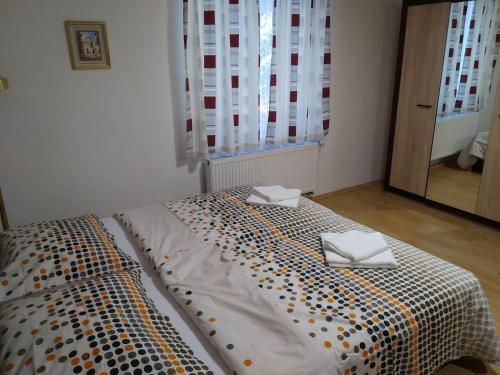 Postel nebo postele na pokoji v ubytování Apartment Benecko 124