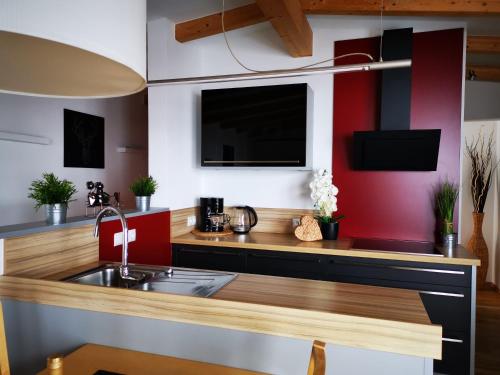 Kuchyň nebo kuchyňský kout v ubytování Appartement Hofer