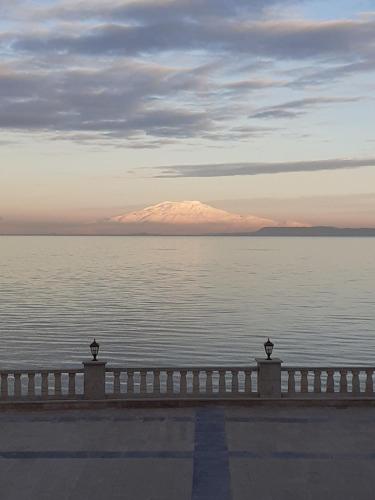 a view of the water with a mountain in the background at Ramada by Wyndham Van in Van