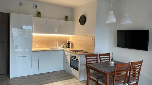 Imagen de la galería de Apartament Eden 5 Mórz Basen&Spa, en Sianożęty