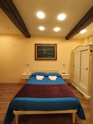 Кровать или кровати в номере Casa di Stella