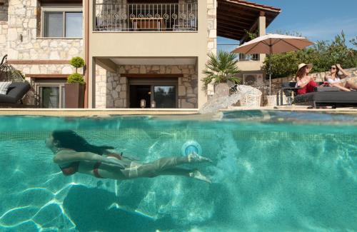 Πισίνα στο ή κοντά στο Five Senses Luxury Villas