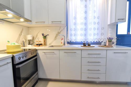 Η κουζίνα ή μικρή κουζίνα στο Bleu Maison De Vivian