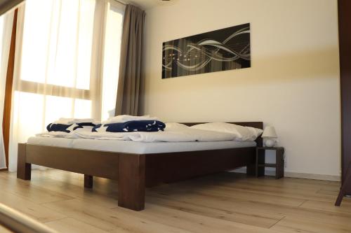Posteľ alebo postele v izbe v ubytovaní Apartmán Olaf Tatranská Lomnica