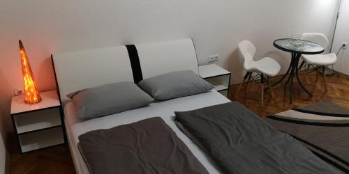 Voodi või voodid majutusasutuse Apartment Cakic toas