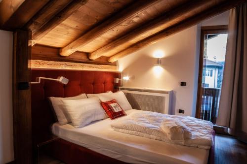 Ένα ή περισσότερα κρεβάτια σε δωμάτιο στο Residenza Marconi