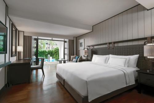 Postel nebo postele na pokoji v ubytování Melia Koh Samui