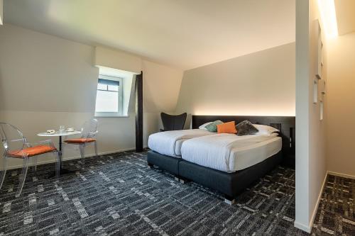מיטה או מיטות בחדר ב-Gîtes Openroc - Vue imprenable sur Colmar