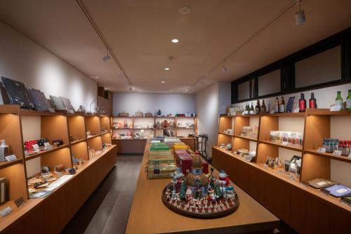 a store room with a long table in the middle at AMANE resort GAHAMA in Beppu