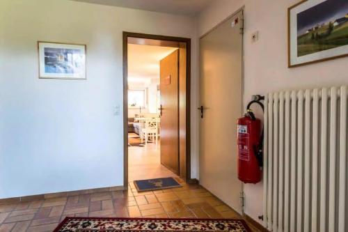 a room with a fire hydrant next to a door at stuub windeck in Hinterzarten