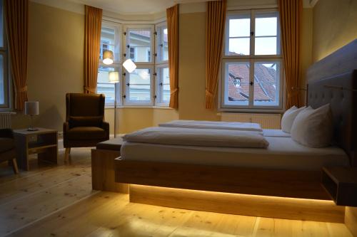 Kunsthaus mit Frühstück im Hotel Theophanoにあるベッド