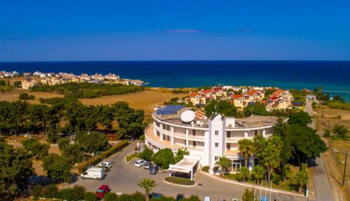 an aerial view of a town with the ocean at Hotel Sempati in Kérynia