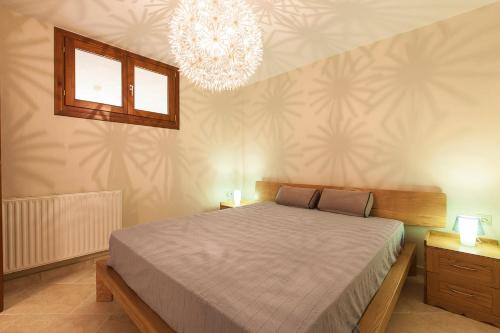 Кровать или кровати в номере Villa Thelma, Trani Ammouda #FeelsLikeHome