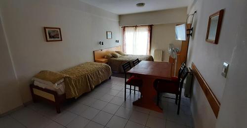 Lova arba lovos apgyvendinimo įstaigoje Patagonia Apart Hotel