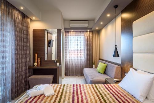 Ένα ή περισσότερα κρεβάτια σε δωμάτιο στο Lito Beach Hotel 